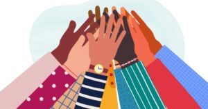 Image of diverse group of hands coming together